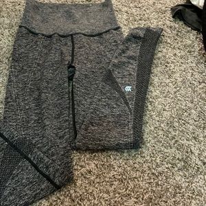 Size medium, speckled gray and black leggings with vented details